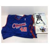 Sports education books and jersey lot