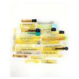 Miniature containers of perfume, assorted