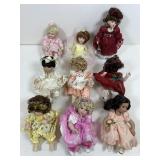 9 Marie Osmond Rose Bud porcelain dolls, assorted