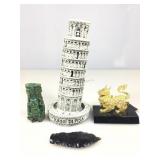 Decorative figures. Tower of Pisa, Lucky Dragon