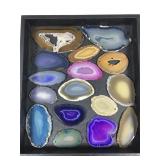 Collection of small geode slices.