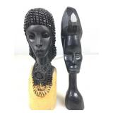 2 carved wood figures.