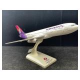 12 in long Sky Marks 1:200 Scale Plane Model -