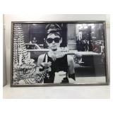 This framed black-and-white photograph captures