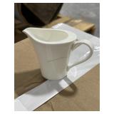 Case of Narumi porcelain creamers, from high end