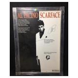 This is a framed Scarface movie poster showing