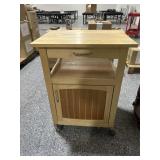 Wood kitchen island w/wheels, approx 23x18x31in