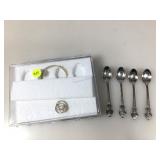 Set of four Rolex small spoons and plastic case