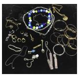 Bag of costume jewelry including necklaces