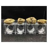 Set a four Lucite napkin rings with a geode