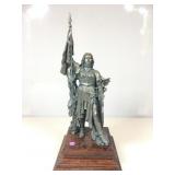 This cast metal statue depicts the French heroin