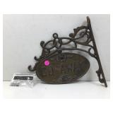 A novelty Cast Iron Sign with bracket.. one side