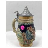 This is a vintage German beer Stein featuring a