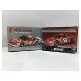 One lot with two model race cars both by AMT one
