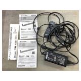 Plastic bag full of Sharp wires and remotes for a