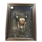 This image shows a framed shadowbox featuring a