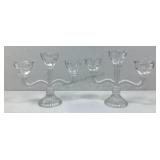 This is a pair of vintage three arm glass