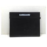 A black cardguard folder with seven full pages of