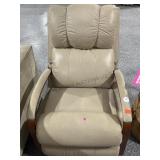 Cream pleather lever recliner, approx 29in long,
