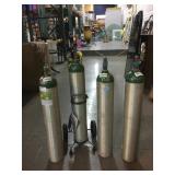 4 Oxygen tanks w/1 drive stand, sz 24 FT3