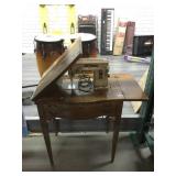Singer sewing machine w/cabinet, approx 53in long