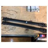 Black metal roof racks, approx 42in long
