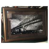 Large framed photo of metal bridge, approx