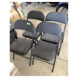 4 metal folding chairs w/padded seat and back