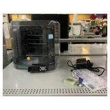 Genmitsu laser printer used with power cord and