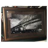 Large framed photo of metal bridge, approx