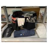 Plastic container with jeans and t shirts
