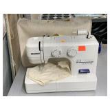 Kenmore sewing machine with dust cover