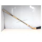 C. Brewer game used hockey stick