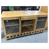 Solid wood entertainment center w/sliding shelf,