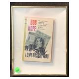 A book framed under glass from the pocket