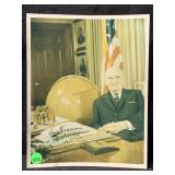 A Signed,  color photograph of former US