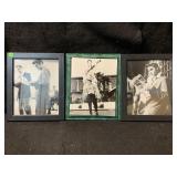 Three framed black-and-white photographs of Elvis
