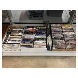 Assorted DVD/VHS Movies & Tv Shows.