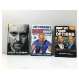 Group of three books related to money management