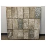 A textured abstract, rectangular canvas wall
