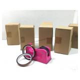 Five bright pink desktop tape dispenser with a