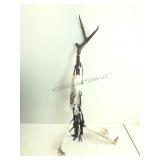 A handcrafted, Native American ceremonial, antler