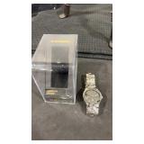 Embassy Gunmetal gray dial silver tone round case