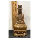 Wood carved statue depicting Guanyin or Quran Yin