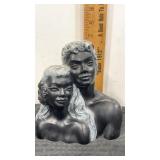 Exotic black coral sculpture of a couple  by