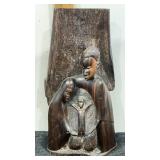 Hand carved sculpture  depicting an African