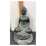 Metal ? Buddha seated cross legged meditating