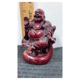 Red resin statue of a laughing Buddha  6" tall
