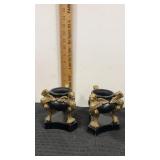 2 cachepot /statue with a black pot supported by