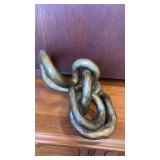 Heavy decorative metal knot figurine